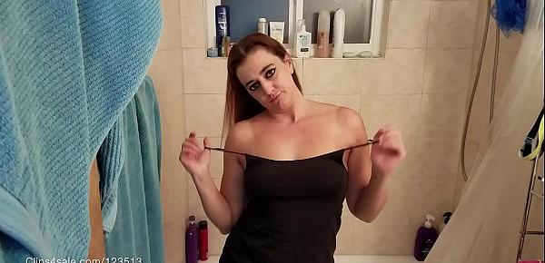  Brunette milf strips off clothes and masturbates in shower